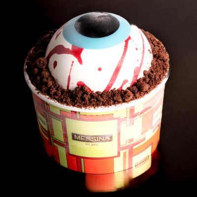 DEATH STARE - Layers of graham crackers, chocolate gelato with chunks of choc brownie chunks, topped with a chocolate eye filled with marshmallow spread and strawberry gel